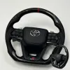 Carbon Fiber Style LC300-Inspired Steering Wheel with Paddle Shifters for Toyota Fortuner, Innova Crysta & Hilux - Copy Carbon Fiber Style LC300-Inspired Steering Wheel with Paddle Shifters for Toyota Fortuner, Innova Crysta & Hilux - Copy