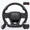 Carbon Fiber Style LC300-Inspired Steering Wheel with Paddle Shifters for Toyota Fortuner, Innova Crysta & Hilux - Copy Carbon Fiber Style LC300-Inspired Steering Wheel with Paddle Shifters for Toyota Fortuner, Innova Crysta & Hilux - Copy