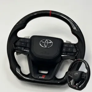 Carbon Fiber Style LC300-Inspired Steering Wheel with Paddle Shifters for Toyota Fortuner, Innova Crysta & Hilux - Orignal OEM