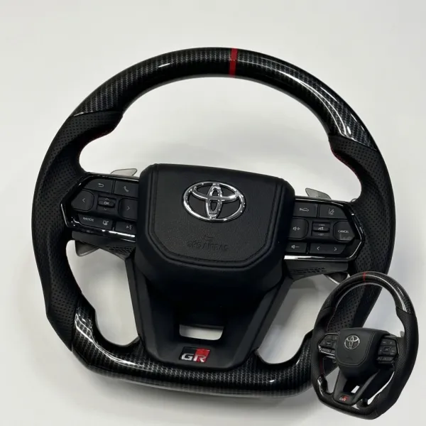 Carbon Fiber Style LC300-Inspired Steering Wheel with Paddle Shifters for Toyota Fortuner, Innova Crysta & Hilux - Copy Carbon Fiber Style LC300-Inspired Steering Wheel with Paddle Shifters for Toyota Fortuner, Innova Crysta & Hilux - Copy